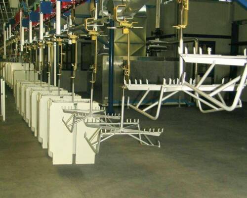 Movin overhead conveyor handling sheet metal parts from the home appliance sector through the painting process
