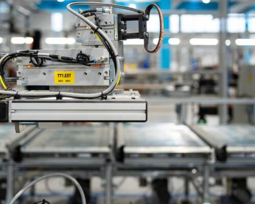 In-line device performing electrical tests on the HVAC product passing along the assembly line